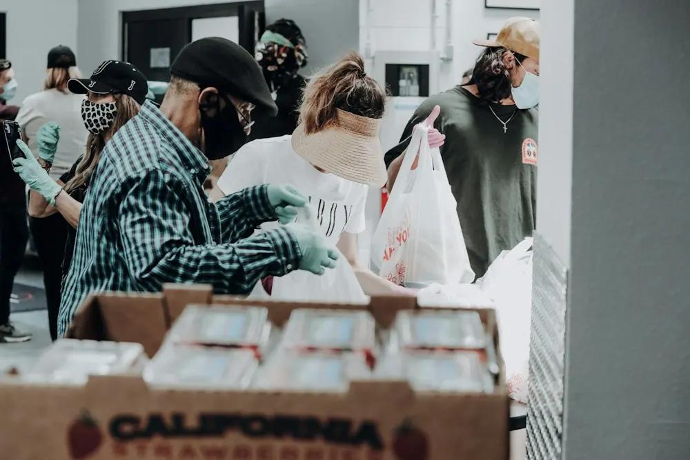 Volunteers packing donations at a food bank