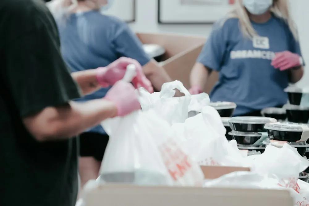 Volunteers packing food bags